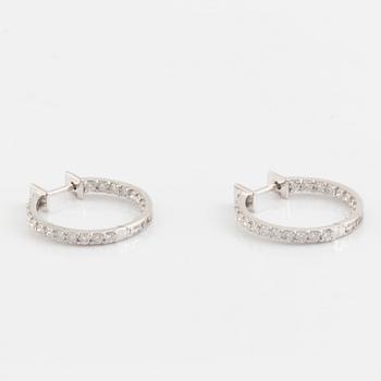 Brilliant cut diamond hoop earrings.