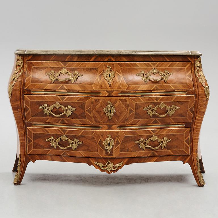 A rococo  gilt-brass mounted and rosewood parquetry commode by J. H. Reimers (master in Stockholm 1754-73).