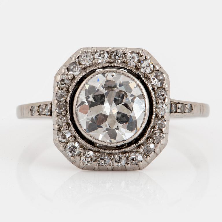 A platinum ring set with an old-cut diamond ca 1.20 cts quality ca G/H si.