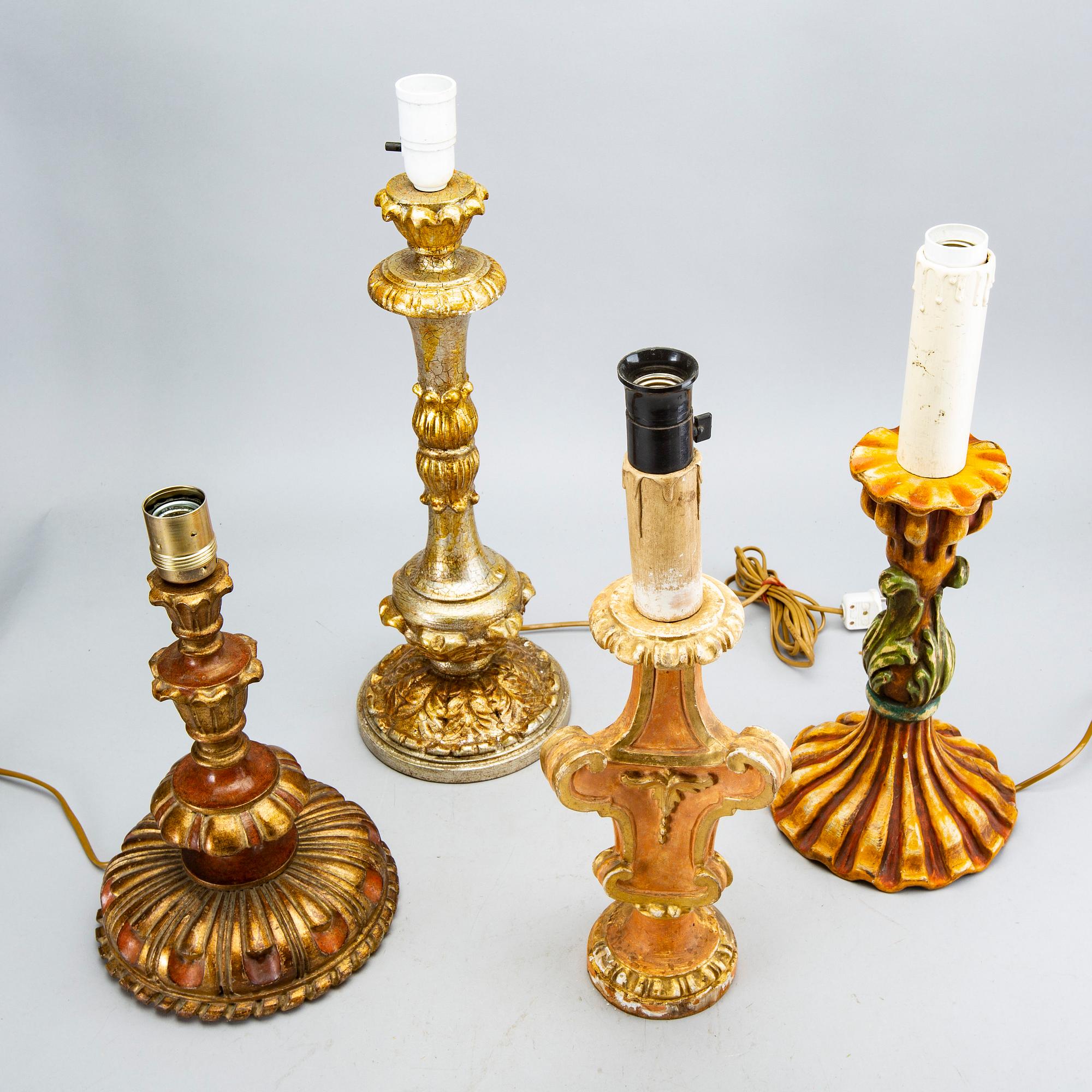 Four mid 20th century wood table lamps from Paoletti, Firenze Italy.