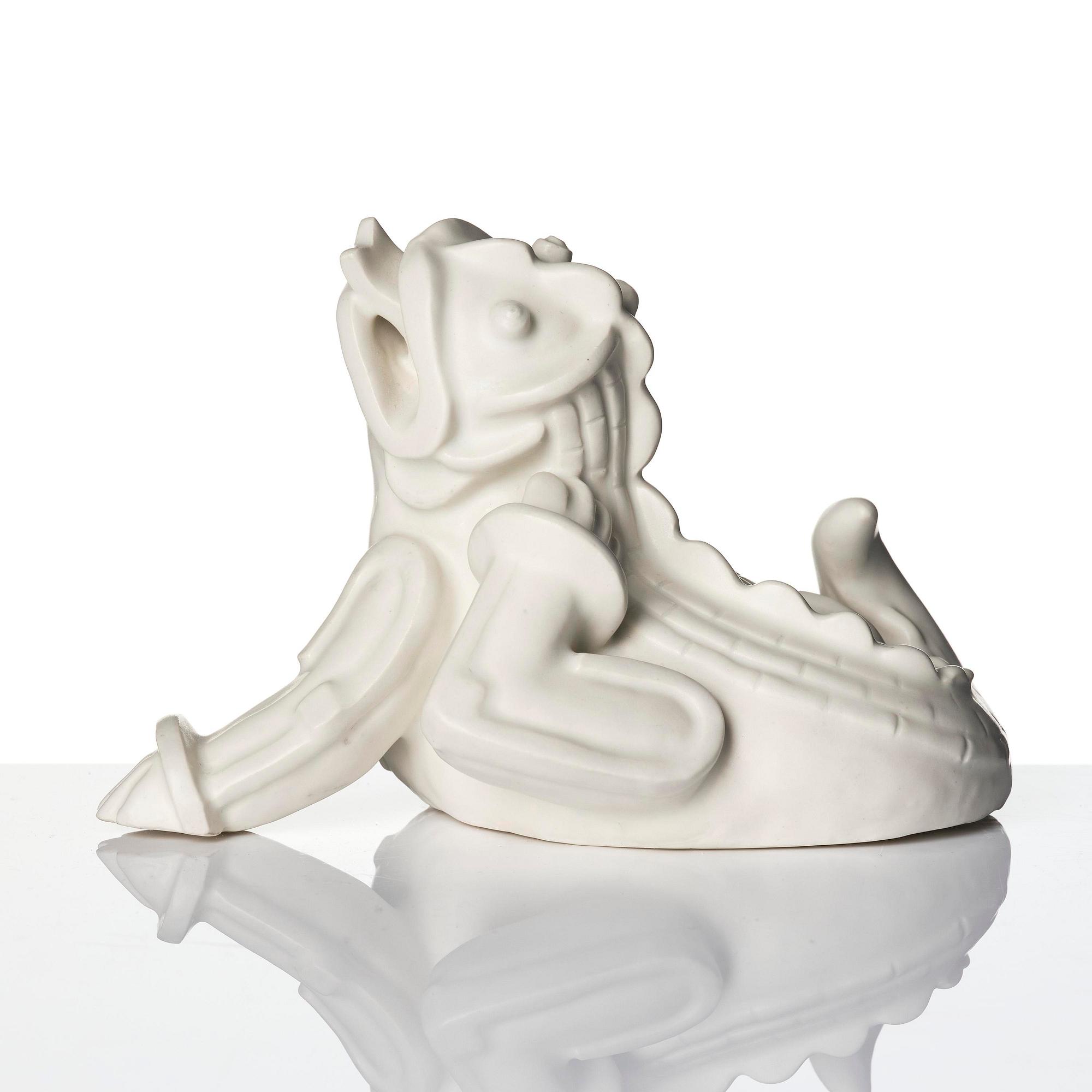 Wilhelm Kåge, a set of two stoneware sculptures of dragon puppies, Gustavsberg, Sweden 1940-50's.