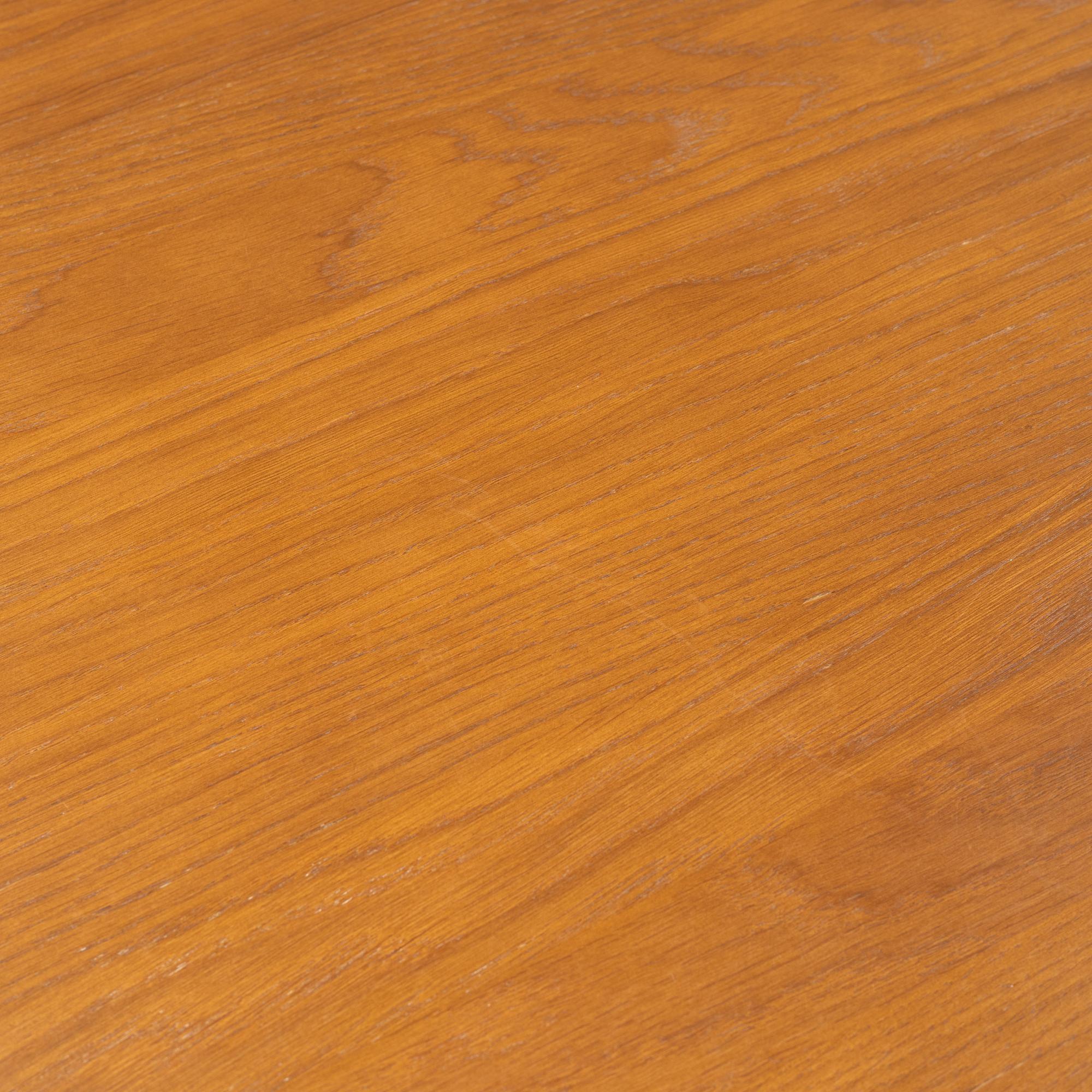 Jonas Lindvall, a stained oak dining table for Stolab.