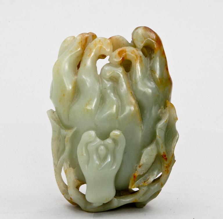 A Chinese nephrite figure of a finger citron.