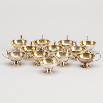 12 1960's silver punch cups. App. 400 gram.