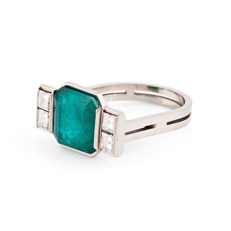 Rey Urban, an 18K white gold ring set with a step-cut emerald, Stockholm 1985.