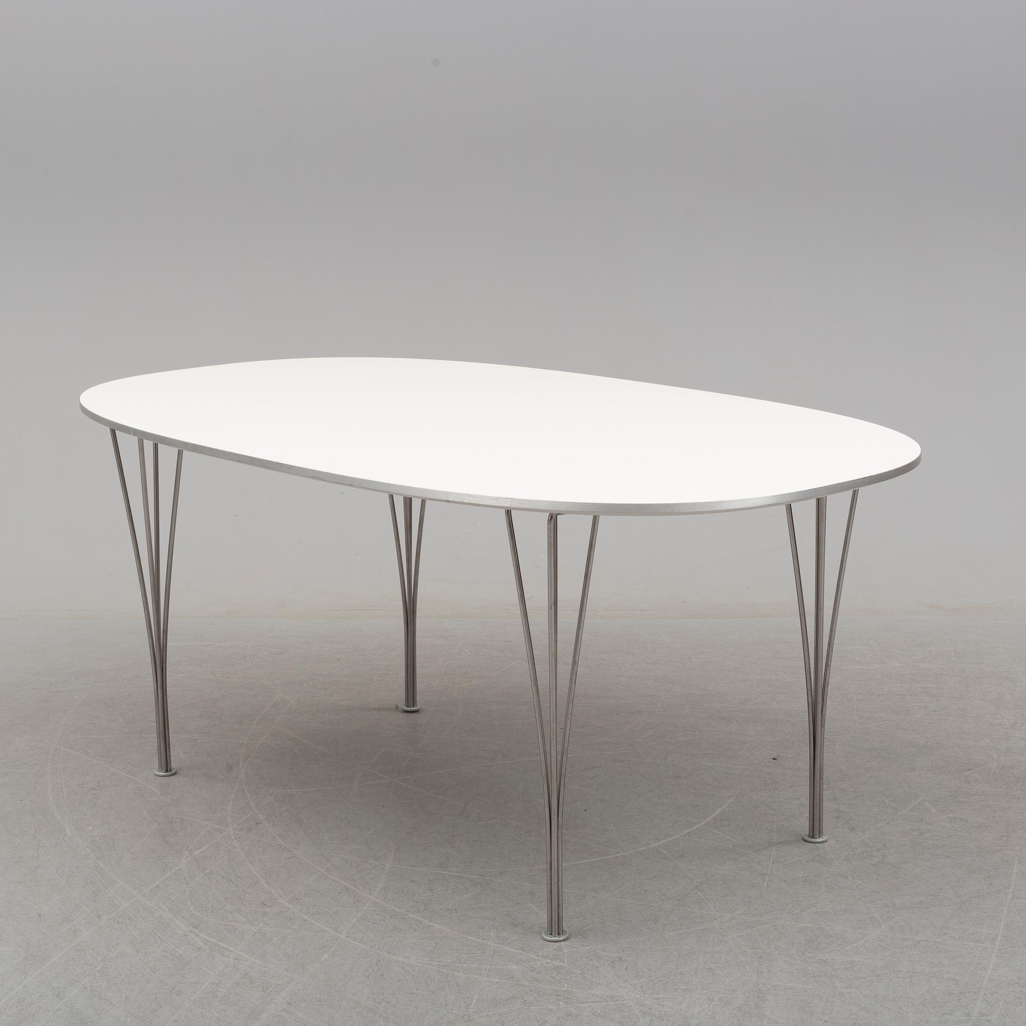 BRUNO MATHSSON & PIET HEIN, a 'Superellips' dining table from Fritz Hansen, Denmark, 2013.