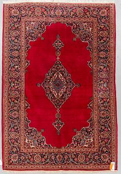 A RUG, semi-antique Kashan, ca 207 x 142 cm.