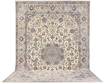 A Nain, part silk carpet, c. 474 x 322 cm.