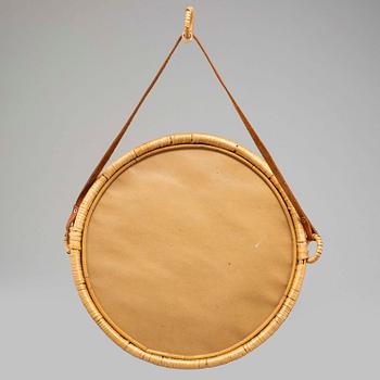 A 1960s rattan frame mirror , possibly Ikea.