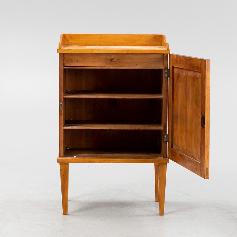 A Gustavian style bedside table, circa 1900.