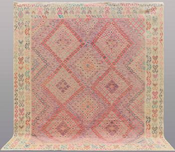A CARPET, Kilim, ca 292 x 265 cm.