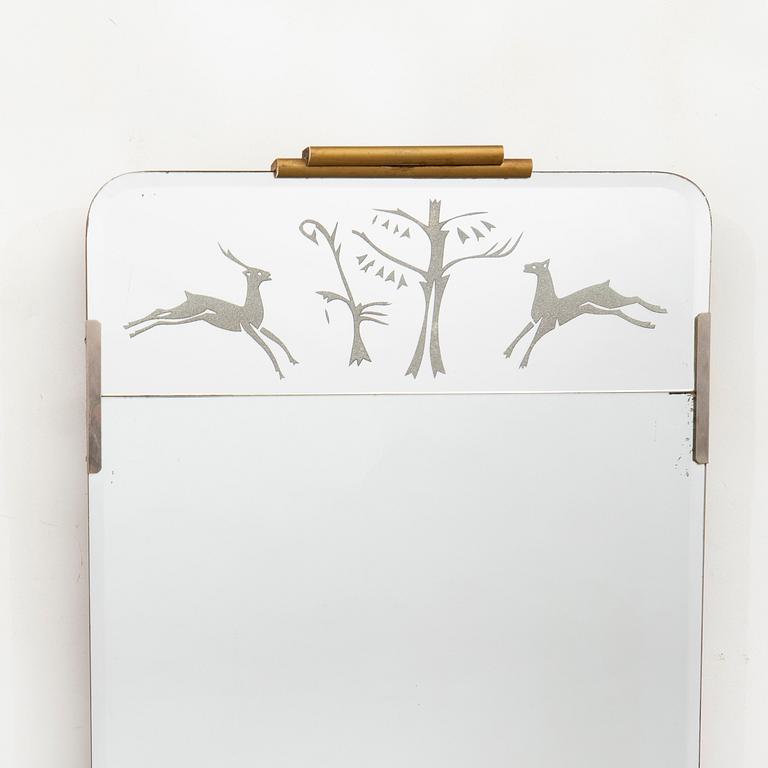 A 1940s Swedish Modern mirror.