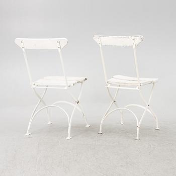 A set of seven garden chairs and two tables Byarums bruk, later part of the 20th century.
