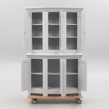 A display cabinet, 20th Century.