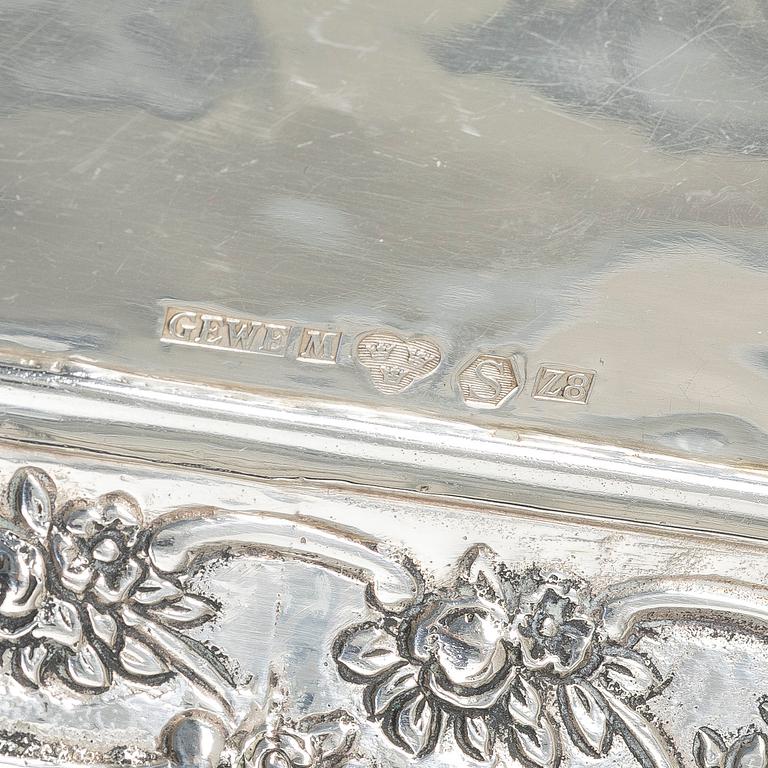 Two creamers, a tray, and a sugar tongs, silver, Rococo and Rococo style, 18th-19th century.