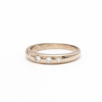 A 14K white gold ring with diamonds ca. 0.15 ct in total. Estetika Oy, Helsinki 2000.