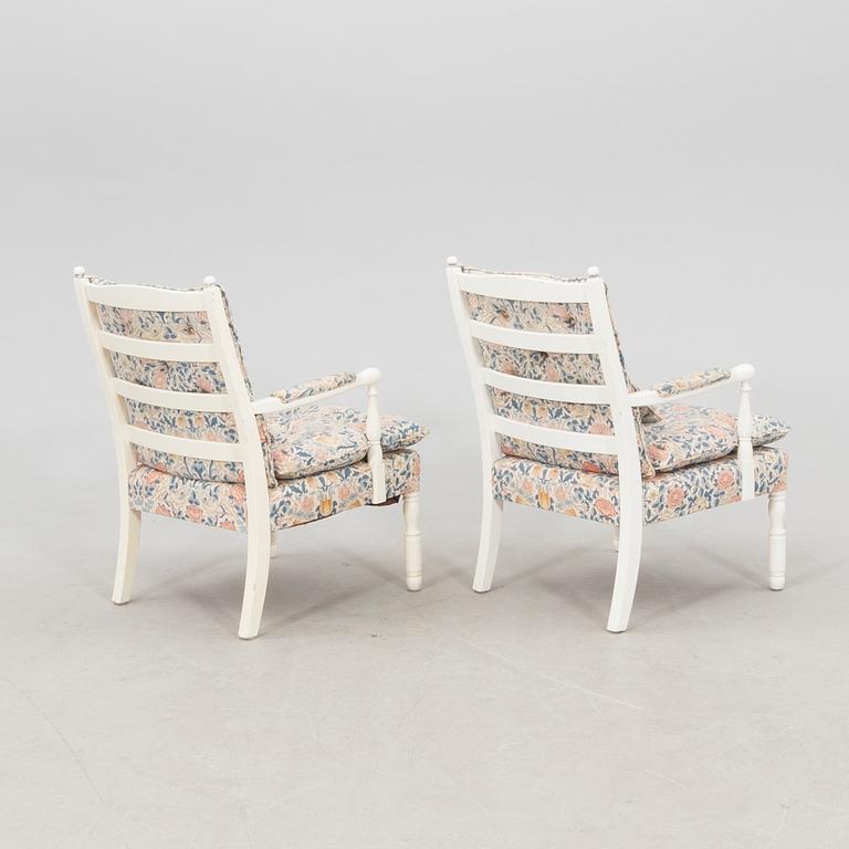 Armchairs, a pair in the Gripsholm model by Nordiska Kompaniet, second half of the 20th century.