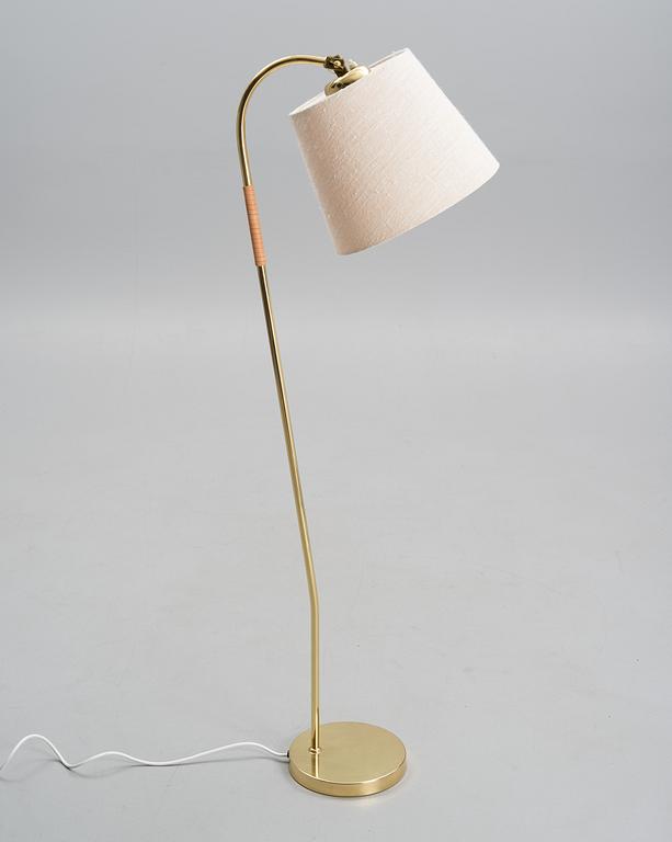 PAAVO TYNELL, A FLOOR LAMP.Manufactured by Idman. 1950s.