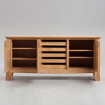 Oscar Nilsson, attributed to, an oak Swedish Modern sideboard, 1940's.