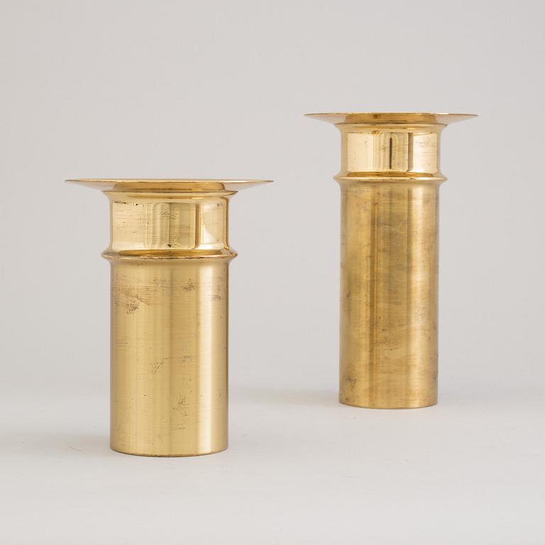 TAPIO WIRKKALA, a pair of brass candlesticks from Kultakeskus Oy, Finland.