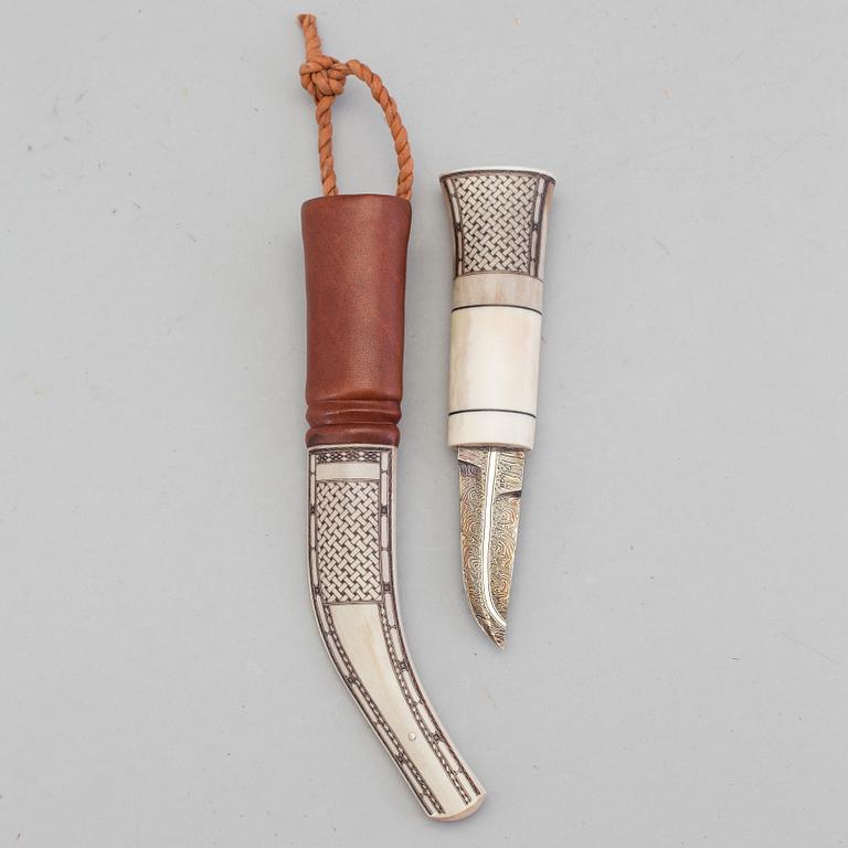 A traditional sami knife by Kay Isaksson in Lycksele. Signed with symbol.