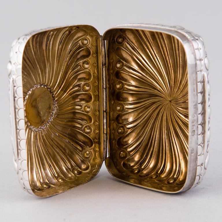 A hinged parcel-gilt soap case, London 1884.