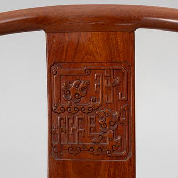 A pair of hardwood 'horse shoe back' hardwood armchairs, Hong Kong, 1960s.