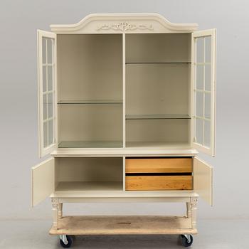 A gustavian style cabinet, last quarter of the 20th century.