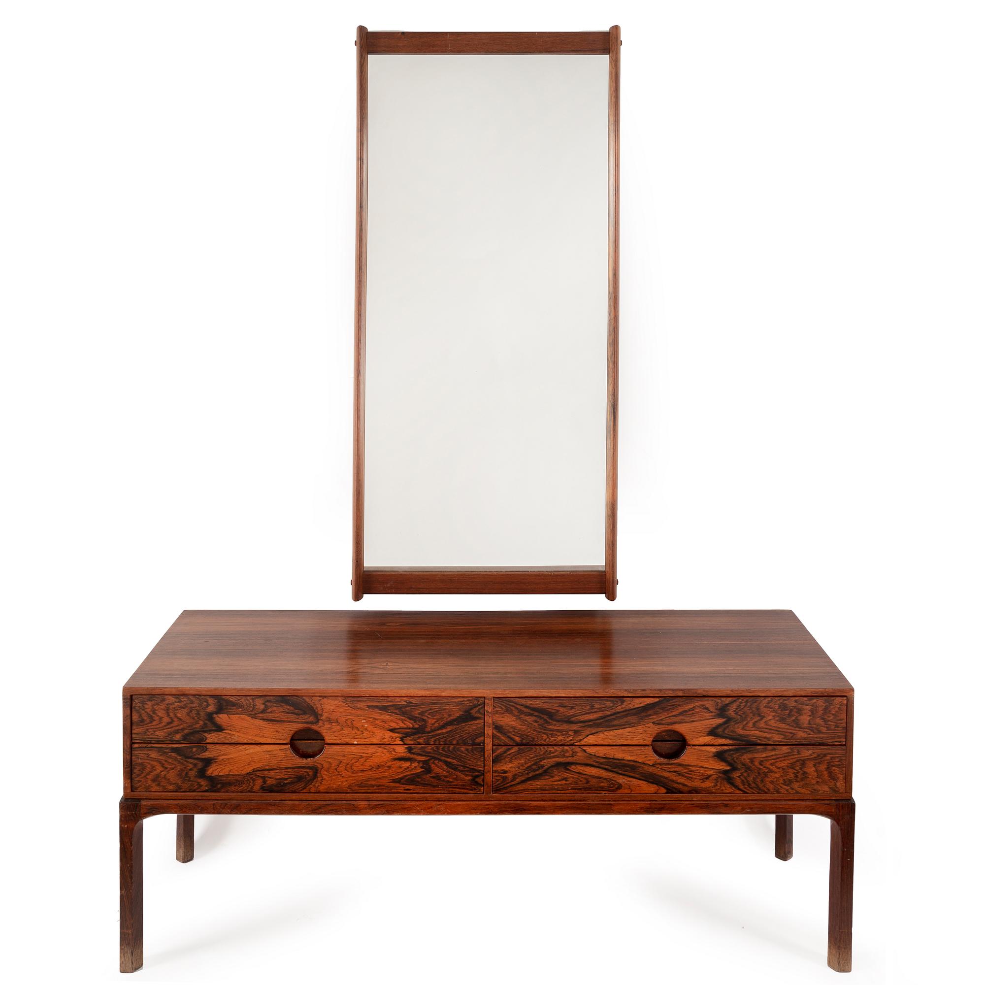 AKSEL KJERSGAARD, a rosewood mirror and chest of drawers from Odder, Denmark, 1960's.
