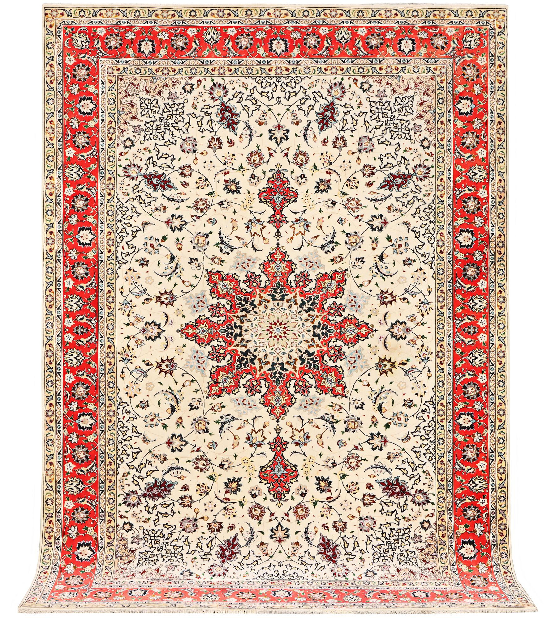 A Tabriz, part silk carpet, c. 300 x 199 cm.