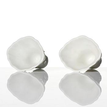 Two blanc de chine rhinoceros libation cups, Qing dynasty, Kangxi (1662-1722).
