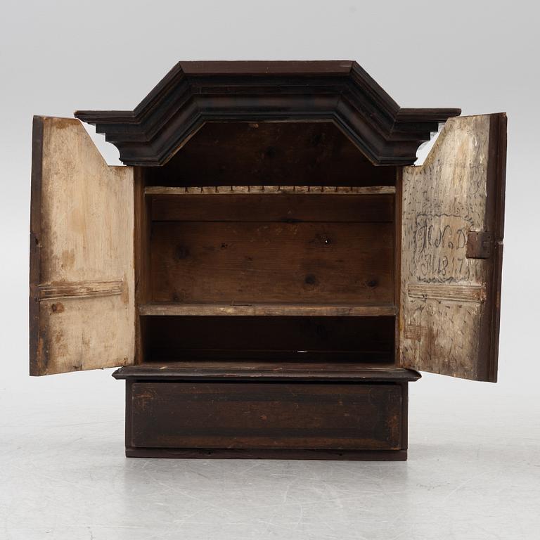 A cabinet, dated 1817.