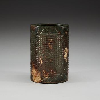 A archaistic stone brush pot.