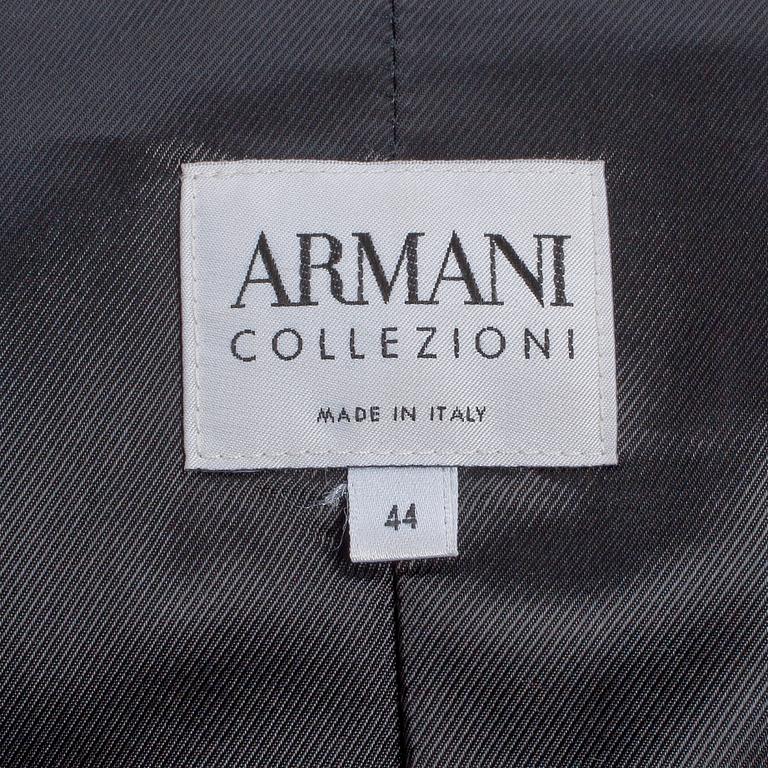 ARMANI COLLEZIONI, a two-piece suit consisting of jacket and pants.