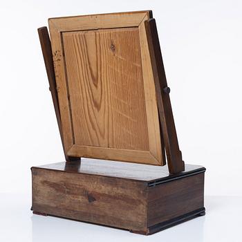 A mahogany table mirror, Sweden, dated 1820.