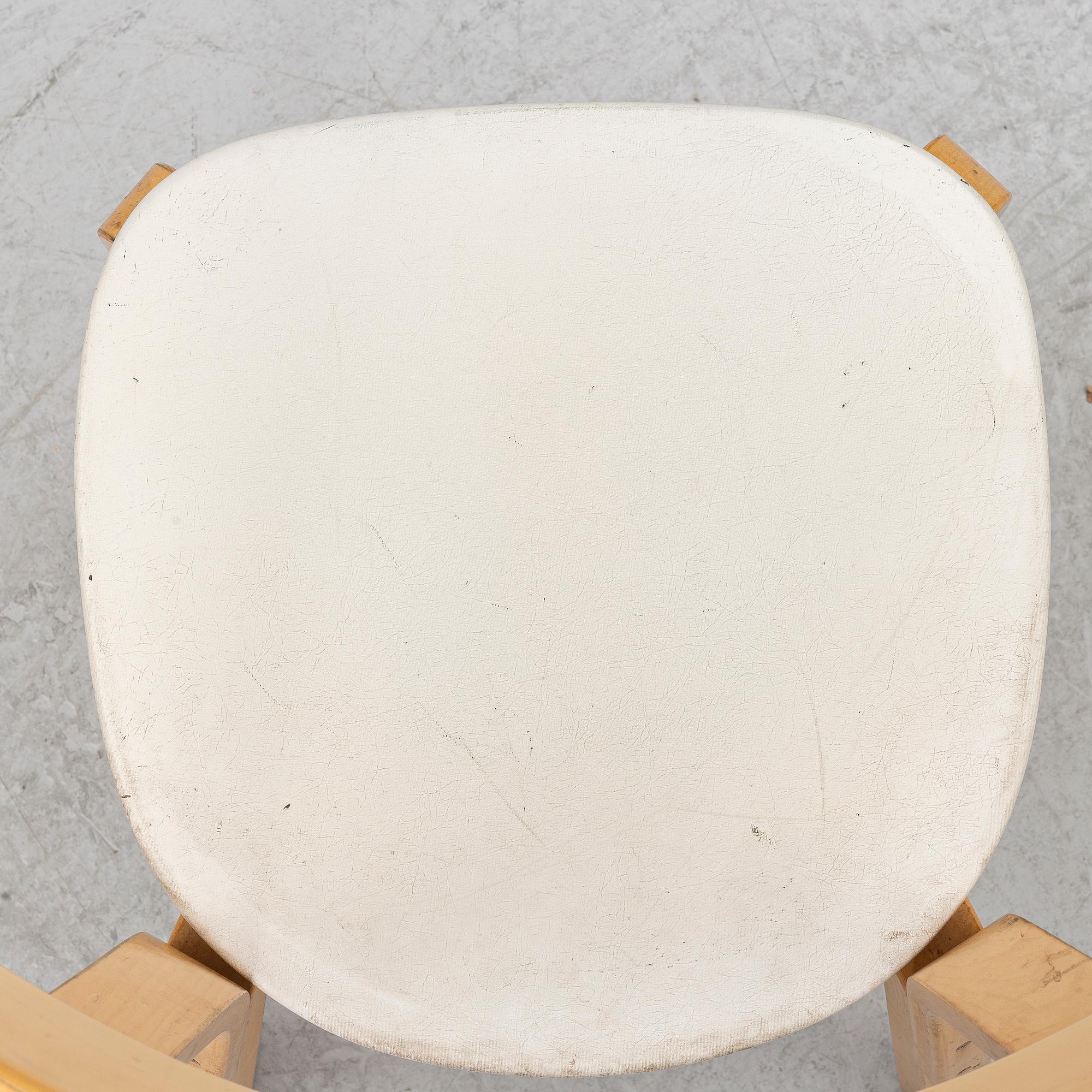 Alvar Aalto, a pair of model 69 chairs, Finland, second half of the 20th century.