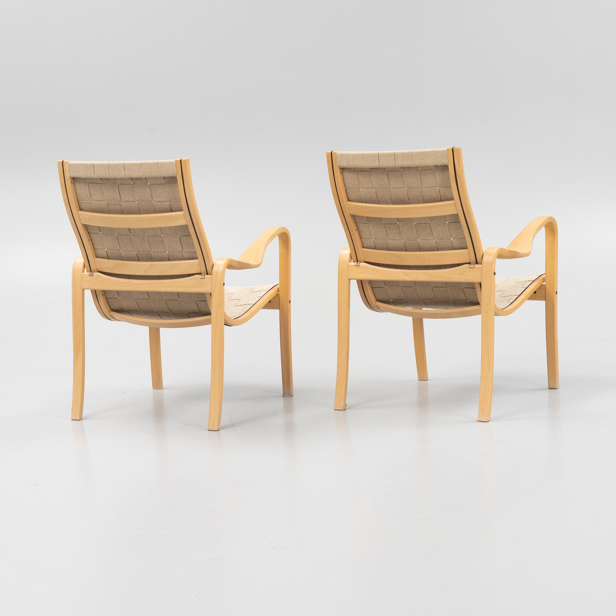 A pair of lounge chairs from Källemo.