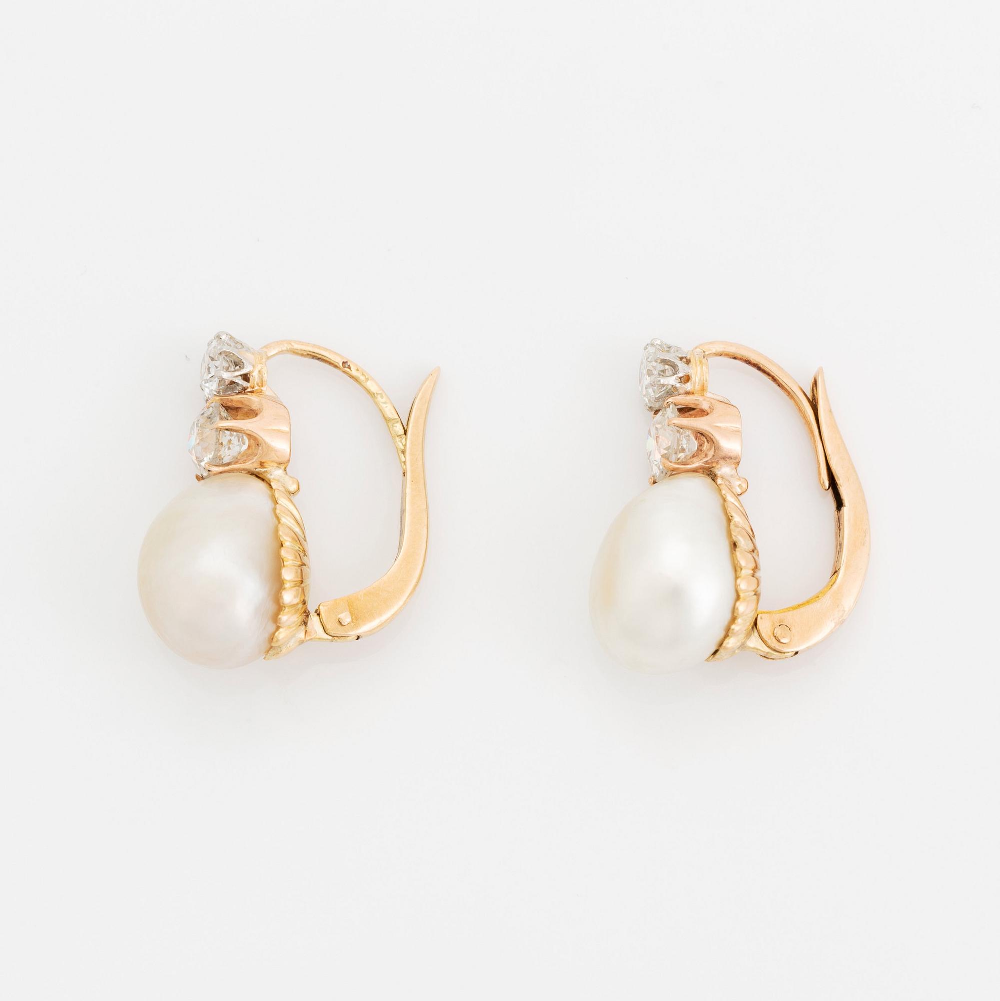 A pair of 18K gold and pearl earrings set with old-cut diamonds.