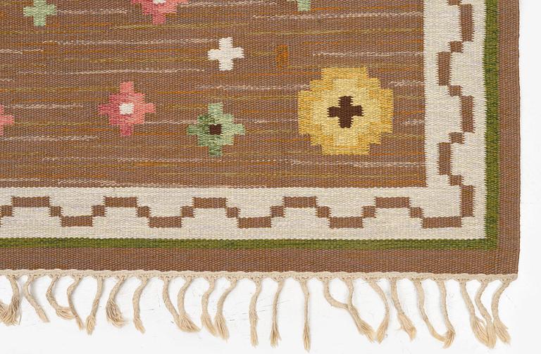 Anna-Greta Sjöqvist, a carpet, 'Blomsteräng', flat weave, ac. 351 x 241 cm, signed AGS.
