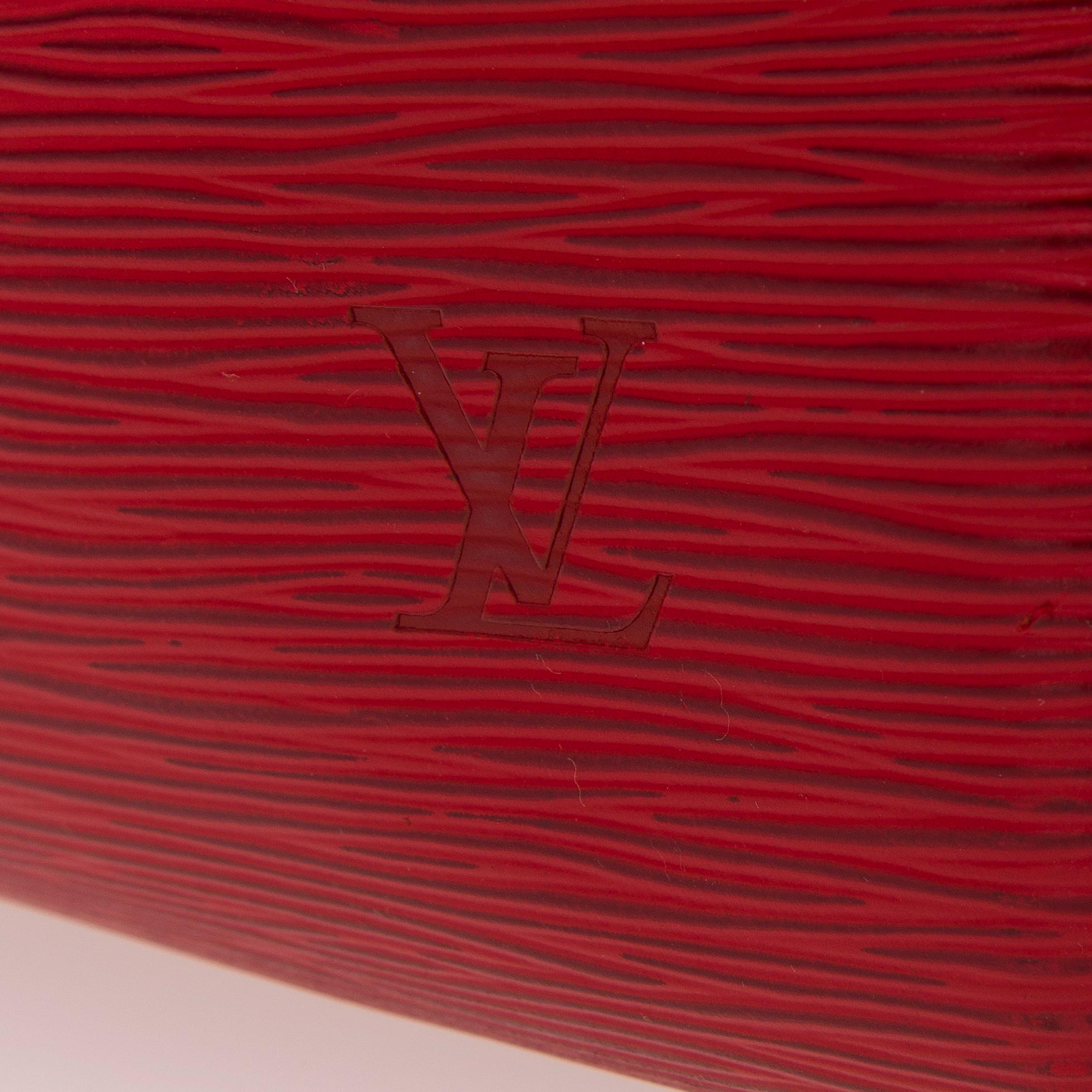 A RED EPI LEATHER KEEPALL 50 TRAVEL BAG.