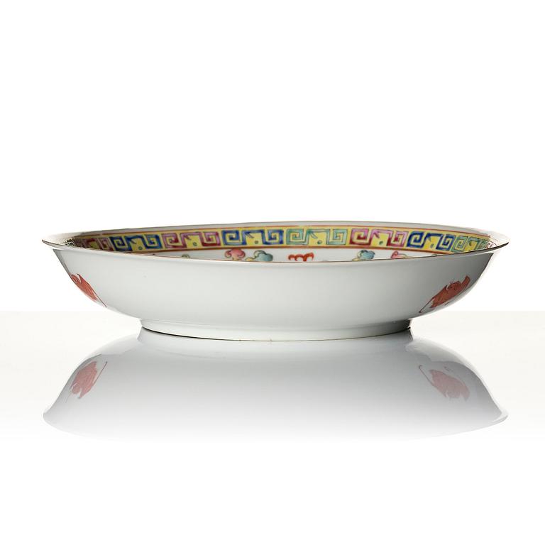 A phoenix and dragon famille rose dish, Qing dynasty, with Guangxu six character mark and period (1875-1908).