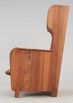 An Axel Einar Hjorth stained pine armchair, 'Lovö', Nordiska Kompaniet.