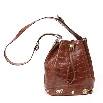 687. A brown crocodile embossed leather shoulder bag.