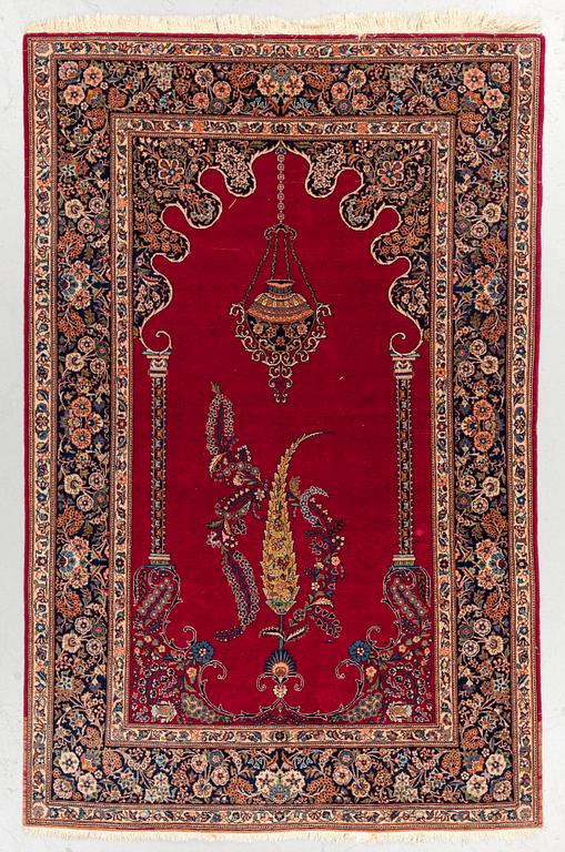 A RUG, semi-antique Kashan, around 210 x 136 cm.