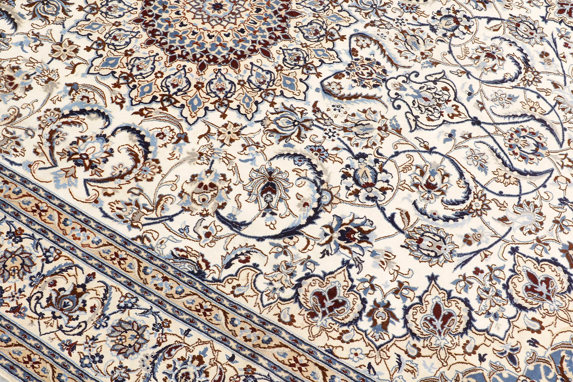A carpet, Nain part silk so called 9LAA, ca 375 x 244 cm.