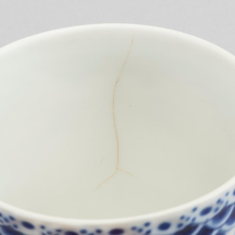 A set of 17 porcelain chocolat cups and saucers Musselmalet Royal Copenhagen Denmark.