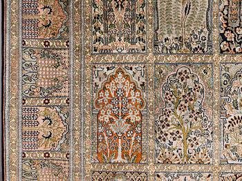 A silk Kashmir carpet, 295 x 178 cm.