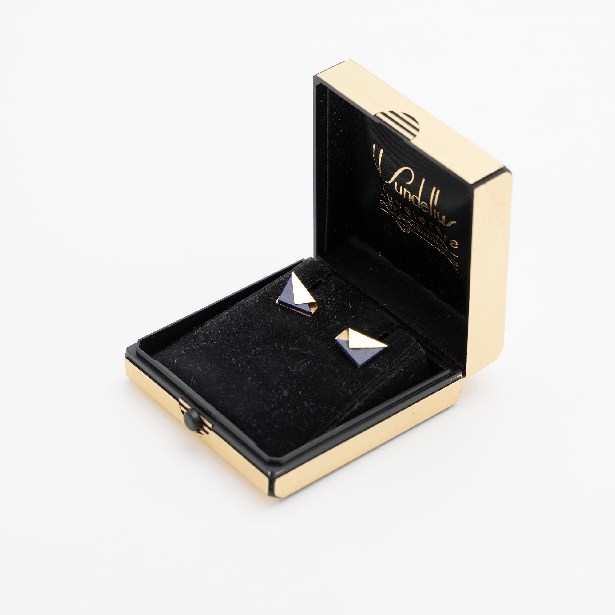 A pair of 18K gold and lapis lazuli earrings.
