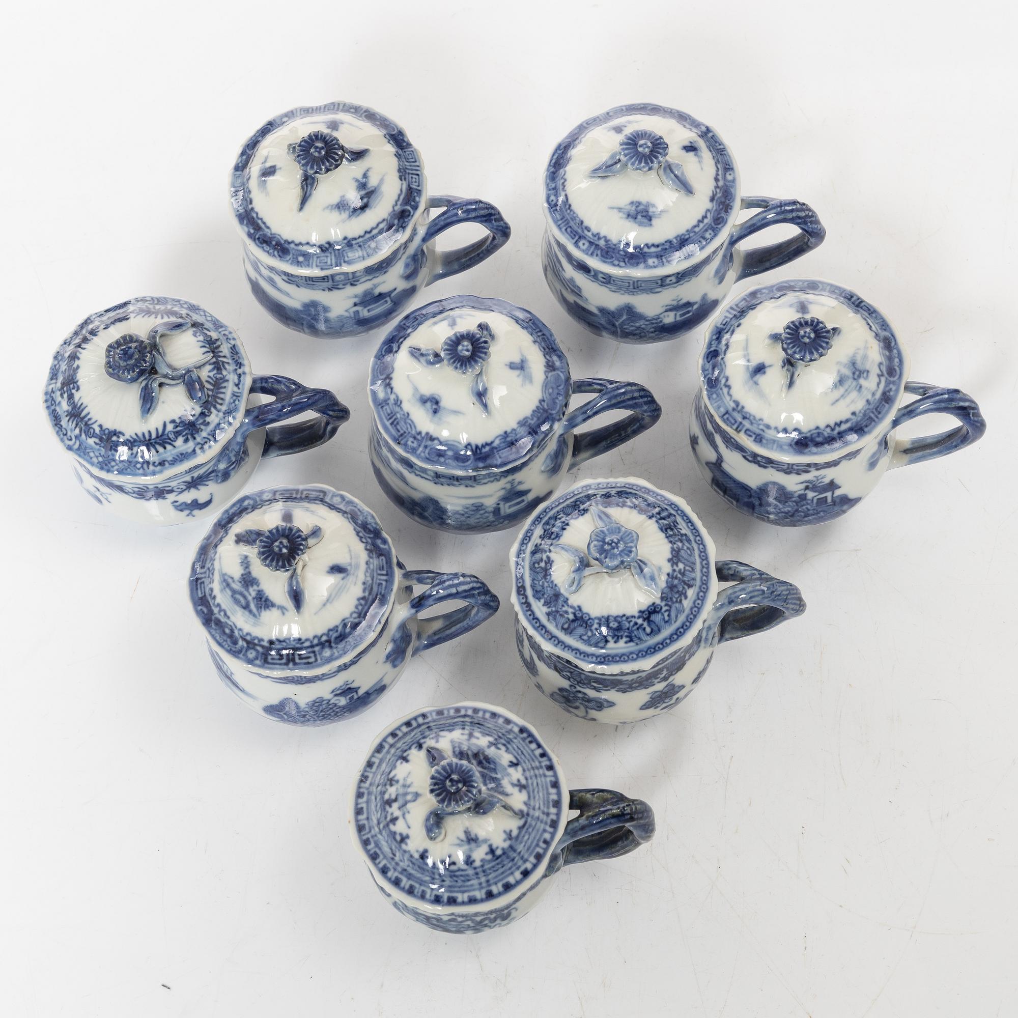 A group of eight Chinese blue and white porcelain custard cups with covers, Qing dynasty, Qianlong (1736-95).
