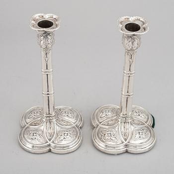 A pair of English 18th century silver candlesticks, marked JB, London 1766.